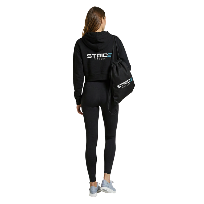 Black STRIDE Fitness drawstring gym bag designed for lightweight storage of workout gear, shoes, and daily essentials