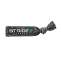 Grey STRIDE Fitness knotted hair tie designed for secure hold during workouts, running, and everyday wear